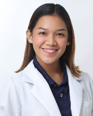 a woman smiling and posing for the camera