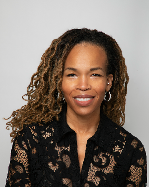 a woman smiling for the camera